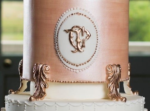 Photograph showing a beautiful bespoke royal icing monogram