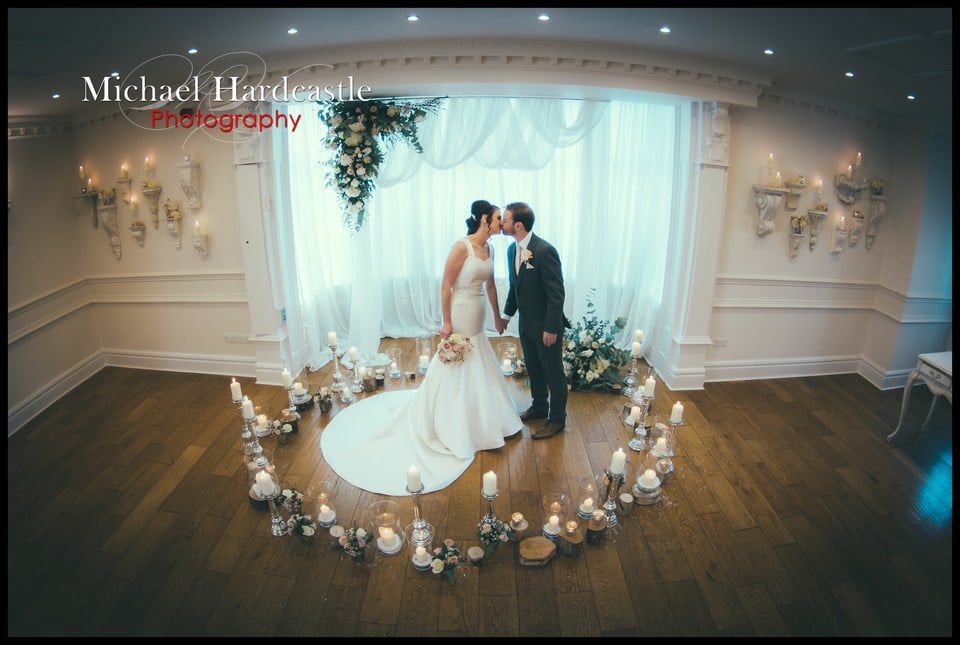 Bride and groom kissing