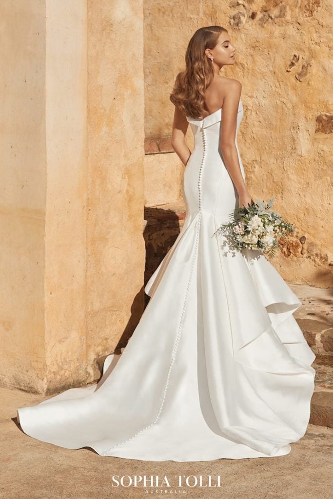 Bride in satin mermaid gown with buttons