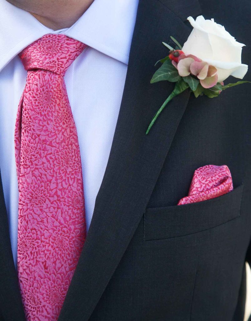 Grooms details tie handkerchief and buttonhole