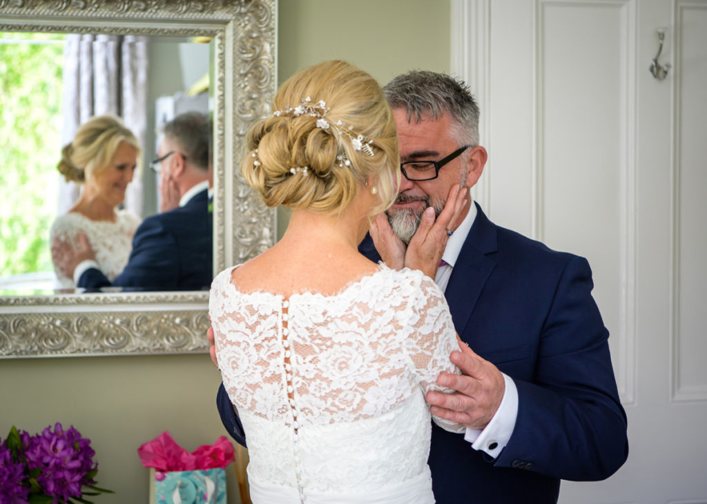 Bride and groom emotonal first look