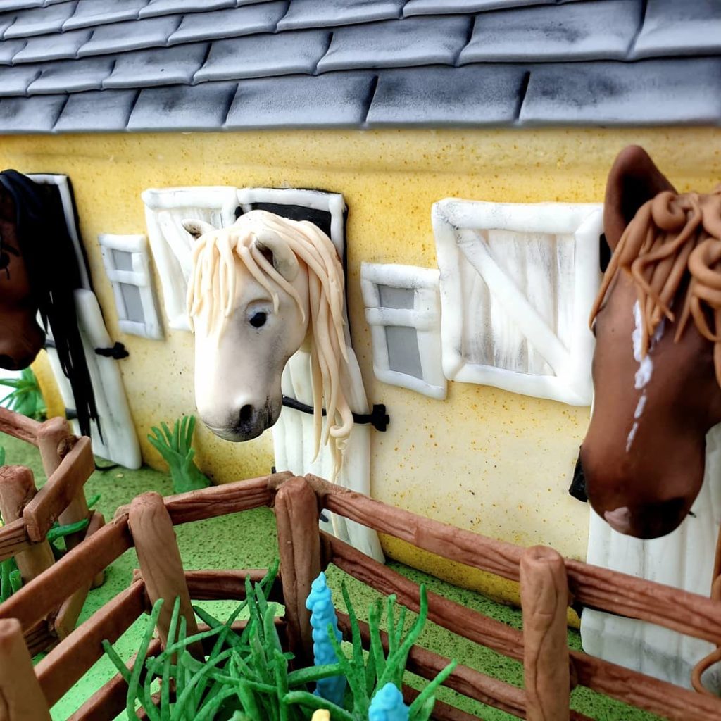 Hand made sugar horses in a stable