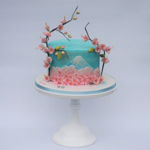 Japanese inspired cake with handpainted Mount Fugi nad sugar cherry blossom branches